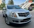 Сірий Каділак SRX, об'ємом двигуна 3 л та пробігом 273 тис. км за 12500 $, фото 1 на Automoto.ua