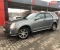 Сірий Каділак SRX, об'ємом двигуна 4.57 л та пробігом 129 тис. км за 7444 $, фото 1 на Automoto.ua