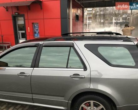 Сірий Каділак SRX, об'ємом двигуна 4.57 л та пробігом 129 тис. км за 7444 $, фото 1 на Automoto.ua