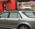 Сірий Каділак SRX, об'ємом двигуна 4.57 л та пробігом 129 тис. км за 7444 $, фото 1 на Automoto.ua