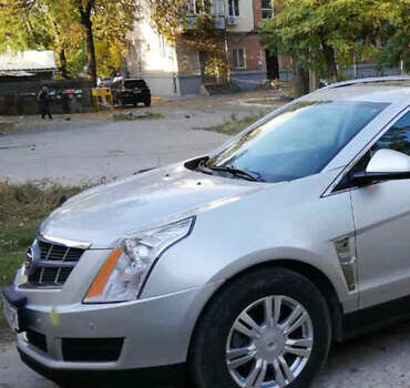 Сірий Каділак SRX, об'ємом двигуна 2.99 л та пробігом 80 тис. км за 12500 $, фото 1 на Automoto.ua