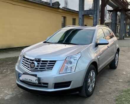 Сірий Каділак SRX, об'ємом двигуна 3.6 л та пробігом 150 тис. км за 7000 $, фото 1 на Automoto.ua