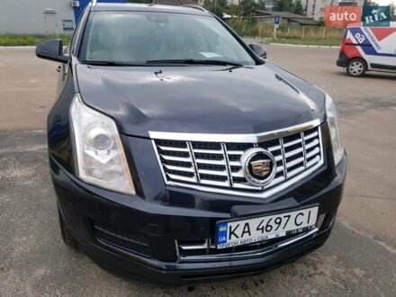 Каділак SRX 2014 у Житомирі на Automoto.ua Синій Каділак SRX, об'ємом двигуна 3.6 л та пробігом 107 тис. км за 15700 $, фото 1 на Automoto.ua