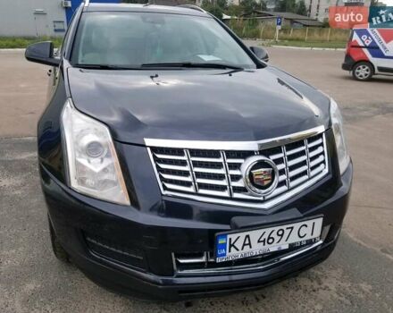 Синій Каділак SRX, об'ємом двигуна 3.6 л та пробігом 107 тис. км за 15700 $, фото 1 на Automoto.ua