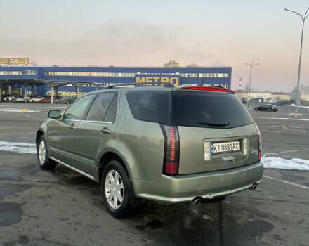 Зелений Каділак SRX, об'ємом двигуна 3.56 л та пробігом 199 тис. км за 4850 $, фото 1 на Automoto.ua