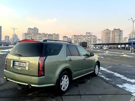 Каділак SRX 2004 у Києві на Automoto.ua Зелений Каділак SRX, об'ємом двигуна 3.6 л та пробігом 199 тис. км за 4999 $, фото 1 на Automoto.ua