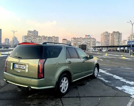 Зелений Каділак SRX, об'ємом двигуна 3.6 л та пробігом 199 тис. км за 4999 $, фото 1 на Automoto.ua