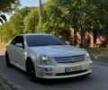 Белый Кадиллак STS, объемом двигателя 3.6 л и пробегом 225 тыс. км за 7900 $, фото 1 на Automoto.ua