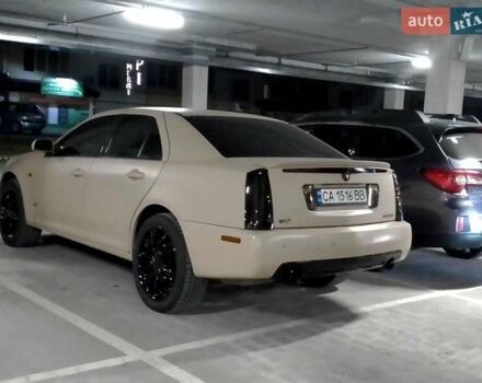 Бежевий Каділак STS, об'ємом двигуна 4.6 л та пробігом 205 тис. км за 12500 $, фото 1 на Automoto.ua