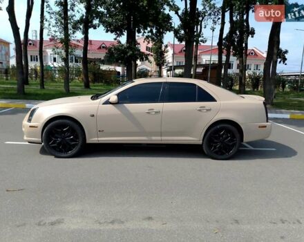 Бежевий Каділак STS, об'ємом двигуна 4.6 л та пробігом 201 тис. км за 12500 $, фото 1 на Automoto.ua