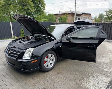 Чорний Каділак STS, об'ємом двигуна 4.6 л та пробігом 167 тис. км за 12000 $, фото 42 на Automoto.ua