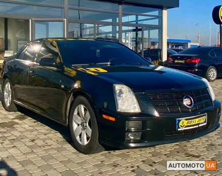 Чорний Каділак STS, об'ємом двигуна 4.6 л та пробігом 180 тис. км за 9500 $, фото 1 на Automoto.ua