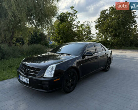 Черный Кадиллак STS, объемом двигателя 4.6 л и пробегом 284 тыс. км за 5700 $, фото 1 на Automoto.ua
