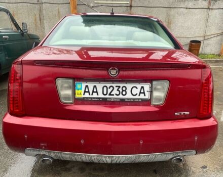 Красный Кадиллак STS, объемом двигателя 3.6 л и пробегом 200 тыс. км за 4300 $, фото 1 на Automoto.ua