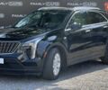 Чорний Каділак XT4, об'ємом двигуна 2 л та пробігом 97 тис. км за 20800 $, фото 1 на Automoto.ua
