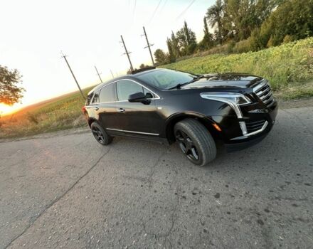 Чорний Каділак XT5, об'ємом двигуна 3.6 л та пробігом 120 тис. км за 18500 $, фото 1 на Automoto.ua