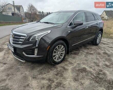 Чорний Каділак XT5, об'ємом двигуна 3.65 л та пробігом 118 тис. км за 17500 $, фото 1 на Automoto.ua