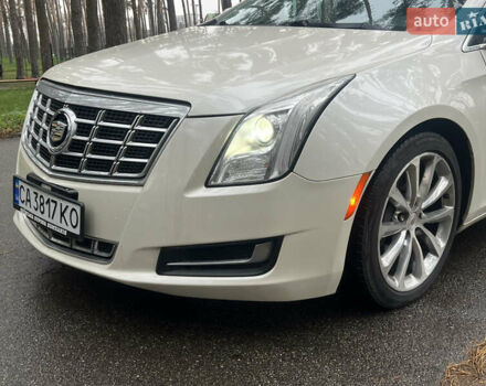Белый Кадиллак ХТС, объемом двигателя 3.56 л и пробегом 130 тыс. км за 12000 $, фото 3 на Automoto.ua