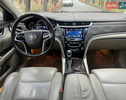Белый Кадиллак ХТС, объемом двигателя 3.56 л и пробегом 130 тыс. км за 12000 $, фото 13 на Automoto.ua