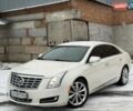 Білий Каділак ХТС, об'ємом двигуна 3.56 л та пробігом 165 тис. км за 9799 $, фото 1 на Automoto.ua