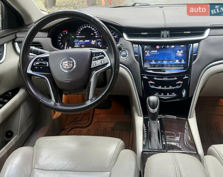 Белый Кадиллак ХТС, объемом двигателя 3.56 л и пробегом 130 тыс. км за 12000 $, фото 10 на Automoto.ua