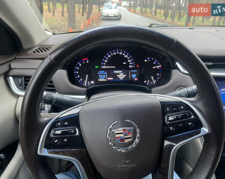 Белый Кадиллак ХТС, объемом двигателя 3.56 л и пробегом 130 тыс. км за 12000 $, фото 12 на Automoto.ua