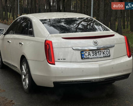 Белый Кадиллак ХТС, объемом двигателя 3.56 л и пробегом 130 тыс. км за 12000 $, фото 6 на Automoto.ua