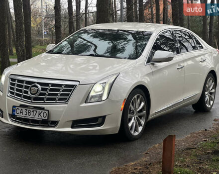 Белый Кадиллак ХТС, объемом двигателя 3.56 л и пробегом 130 тыс. км за 12000 $, фото 1 на Automoto.ua