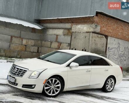 Білий Каділак ХТС, об'ємом двигуна 3.56 л та пробігом 165 тис. км за 9799 $, фото 2 на Automoto.ua