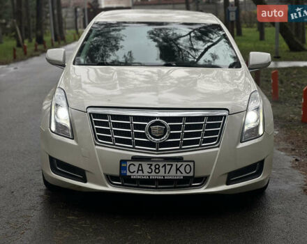Белый Кадиллак ХТС, объемом двигателя 3.56 л и пробегом 130 тыс. км за 12000 $, фото 2 на Automoto.ua