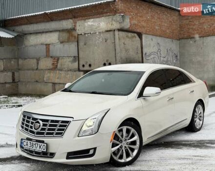 Белый Кадиллак ХТС, объемом двигателя 3.56 л и пробегом 165 тыс. км за 9799 $, фото 1 на Automoto.ua