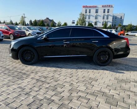 Черный Кадиллак ХТС, объемом двигателя 3.6 л и пробегом 180 тыс. км за 16600 $, фото 3 на Automoto.ua