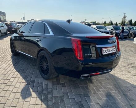 Черный Кадиллак ХТС, объемом двигателя 3.6 л и пробегом 180 тыс. км за 16600 $, фото 4 на Automoto.ua