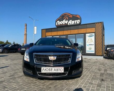 Черный Кадиллак ХТС, объемом двигателя 3.6 л и пробегом 180 тыс. км за 16600 $, фото 1 на Automoto.ua