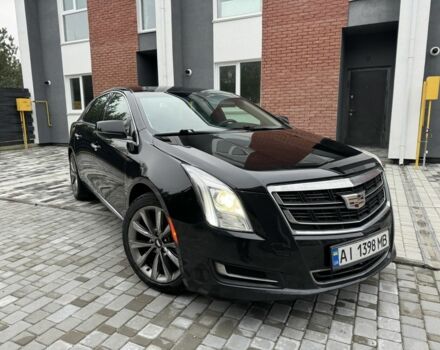 Черный Кадиллак ХТС, объемом двигателя 3.6 л и пробегом 330 тыс. км за 13000 $, фото 1 на Automoto.ua