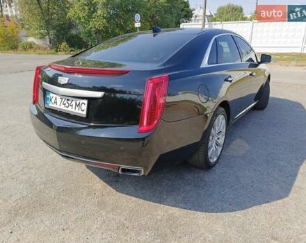 Черный Кадиллак ХТС, объемом двигателя 3.6 л и пробегом 140 тыс. км за 15800 $, фото 6 на Automoto.ua