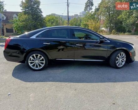 Черный Кадиллак ХТС, объемом двигателя 3.6 л и пробегом 140 тыс. км за 15800 $, фото 7 на Automoto.ua