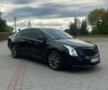 Черный Кадиллак ХТС, объемом двигателя 3.6 л и пробегом 215 тыс. км за 17000 $, фото 1 на Automoto.ua