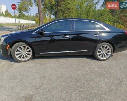 Черный Кадиллак ХТС, объемом двигателя 3.6 л и пробегом 140 тыс. км за 15800 $, фото 2 на Automoto.ua