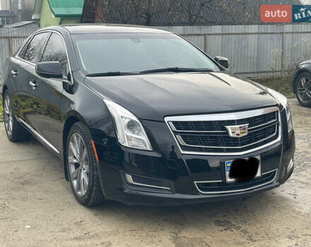 Черный Кадиллак ХТС, объемом двигателя 3.56 л и пробегом 275 тыс. км за 15600 $, фото 1 на Automoto.ua