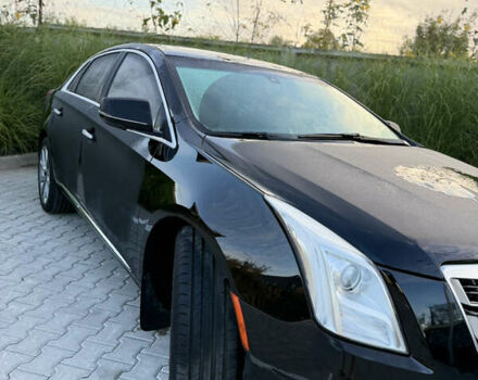Чорний Каділак ХТС, об'ємом двигуна 3.56 л та пробігом 270 тис. км за 15000 $, фото 1 на Automoto.ua