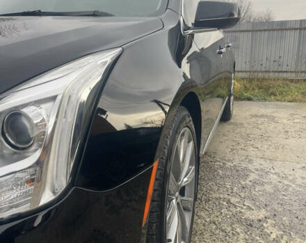 Черный Кадиллак ХТС, объемом двигателя 3.56 л и пробегом 275 тыс. км за 15600 $, фото 3 на Automoto.ua