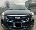Черный Кадиллак ХТС, объемом двигателя 3.56 л и пробегом 275 тыс. км за 15600 $, фото 1 на Automoto.ua