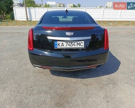 Черный Кадиллак ХТС, объемом двигателя 3.6 л и пробегом 140 тыс. км за 15800 $, фото 5 на Automoto.ua