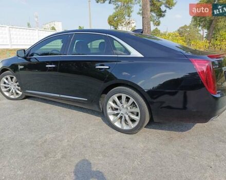 Черный Кадиллак ХТС, объемом двигателя 3.6 л и пробегом 140 тыс. км за 15800 $, фото 3 на Automoto.ua