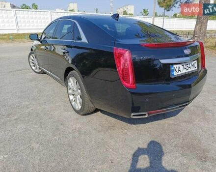 Черный Кадиллак ХТС, объемом двигателя 3.6 л и пробегом 140 тыс. км за 15800 $, фото 4 на Automoto.ua