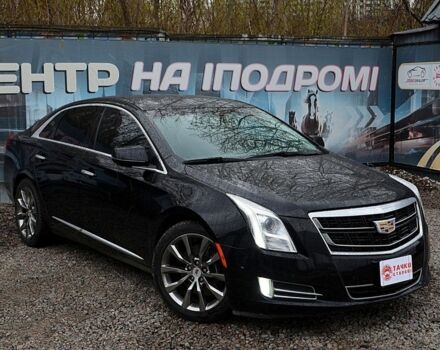 Черный Кадиллак ХТС, объемом двигателя 3.6 л и пробегом 138 тыс. км за 12000 $, фото 1 на Automoto.ua