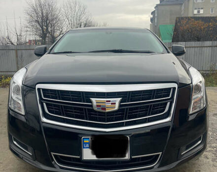 Черный Кадиллак ХТС, объемом двигателя 3.56 л и пробегом 275 тыс. км за 15600 $, фото 1 на Automoto.ua