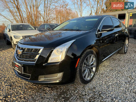 Чорний Каділак ХТС, об'ємом двигуна 3.56 л та пробігом 272 тис. км за 14999 $, фото 1 на Automoto.ua