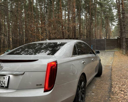 Серый Кадиллак ХТС, объемом двигателя 3.6 л и пробегом 229 тыс. км за 15900 $, фото 3 на Automoto.ua